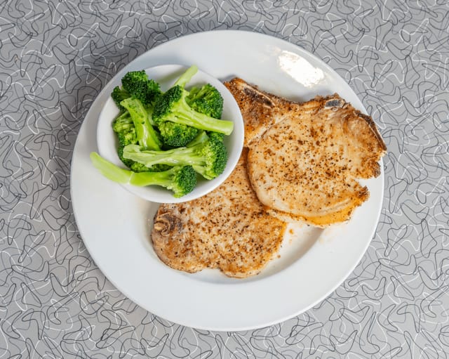 (2) Pork Chop Breakfast.